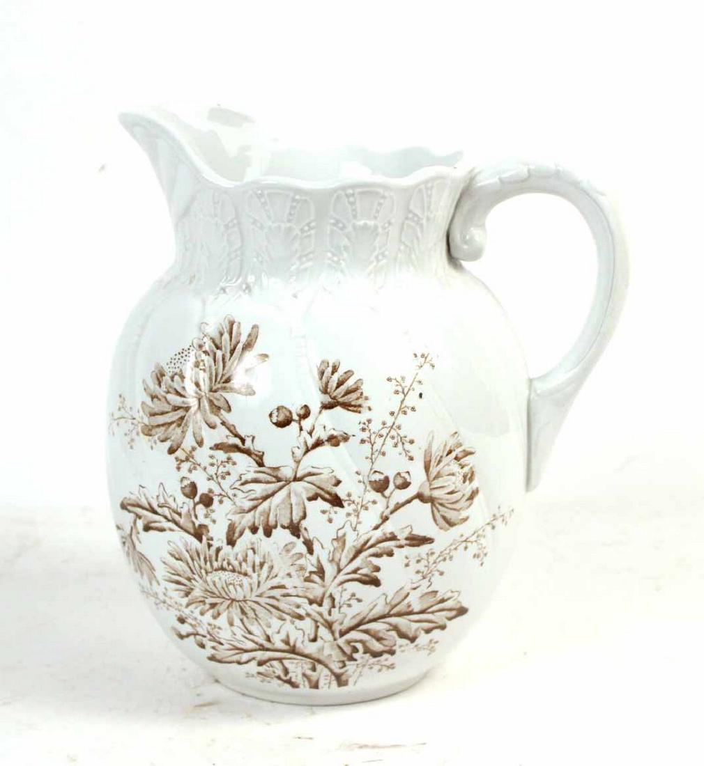 Brown and White Ironstone Cider Pitcher: Marked at base, "Florida". 11"h
