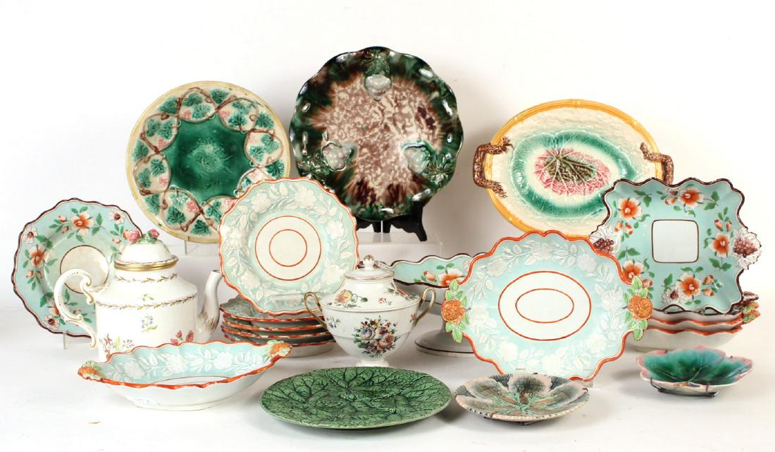 Group of Majolica and Pearlware: Comprising six majolica dishes, turquoise and orange compote and matching square dishes and a bowl. Four Wedgwood style turquoise and orange oval dishes and five matching under plates. Together with a