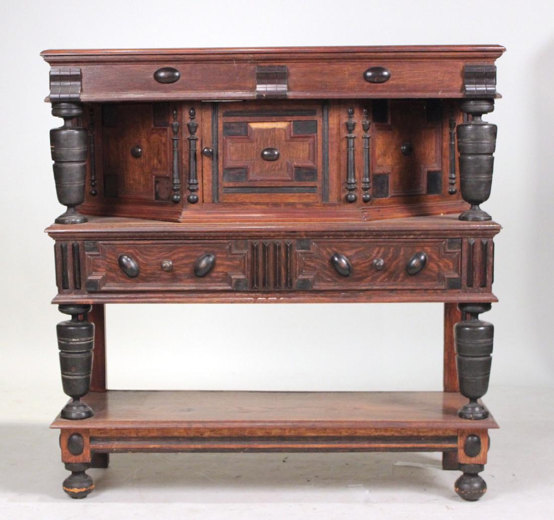 Joined Oak Court Cupboard: In the New England tradition, part-ebonized, 19/20th c. 47"h x 46.5"w x 15.5"d By descent from the Estate of Robert Weeks DeForest and Emily Johnson DeForest.