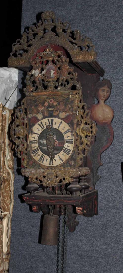 A Painted Wag-on-the-Wall Clock,: Probably Flemish, 17th/ 18th c 28"h x 14"w By descent from the Estate of Robert Weeks DeForest and Emily Johnson DeForest.
