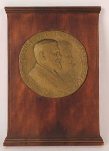 Cast Bronze Medallion on Mahogany Plaque: Evelyn Beatrice Longman, (American, 1874-1954), Commemorating their 50th Wedding Anniversary Inscribed on border, "Robert Weeks DeForest/ Emily Johnston DeForest/ 1922" and monogrammed l.l. "EBL" 11 1