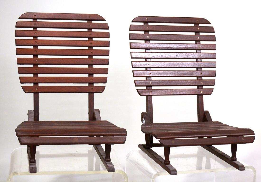 Pair of Mahogany Folding Guideboat Seats: Early 20th C. Probably American. 23.5"h x 17"w x 20"d By descent from the Estate of Robert Weeks DeForest and Emily Johnson DeForest.