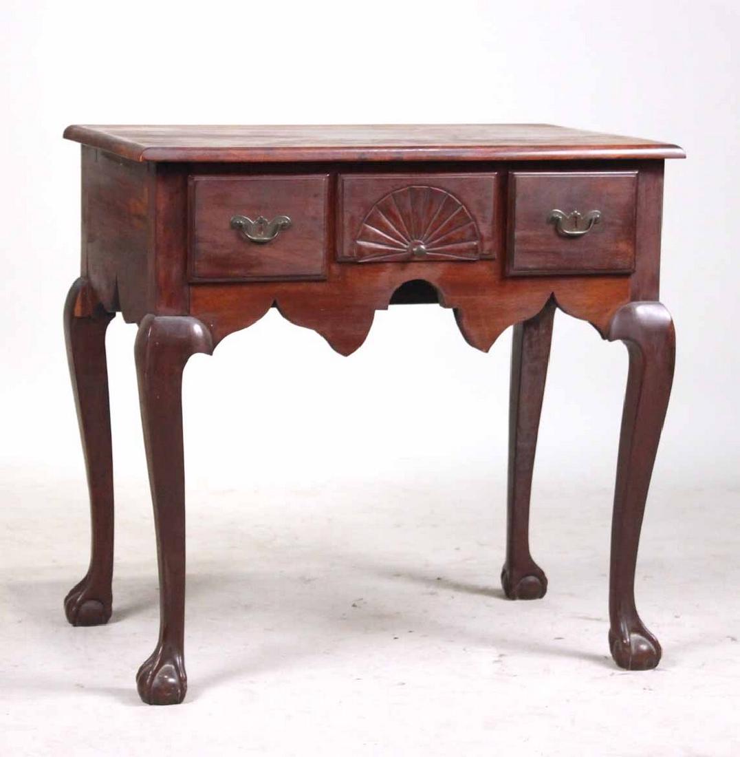Chippendale Style Cherrywood Lowboy: 20th C. 31"h x 32"w x 20"d By descent from the Estate of Robert Weeks DeForest and Emily Johnson DeForest.