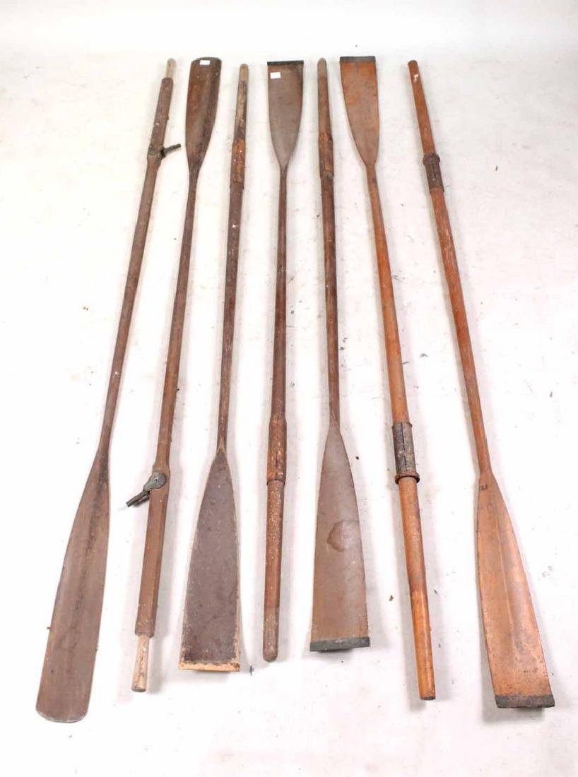 Seven Vintage Oars: 8'l By descent from the Estate of Robert Weeks DeForest and Emily Johnson DeForest.