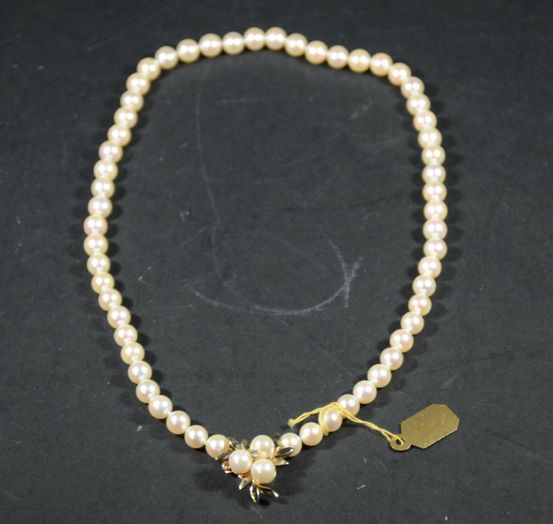 Cultured Pearl Necklace: With 14K yellow gold pearl & diamond clasp, pearls, 7-7.5MM. 18.5"l. From The Personal Property of Claus & Irma Vollrath.