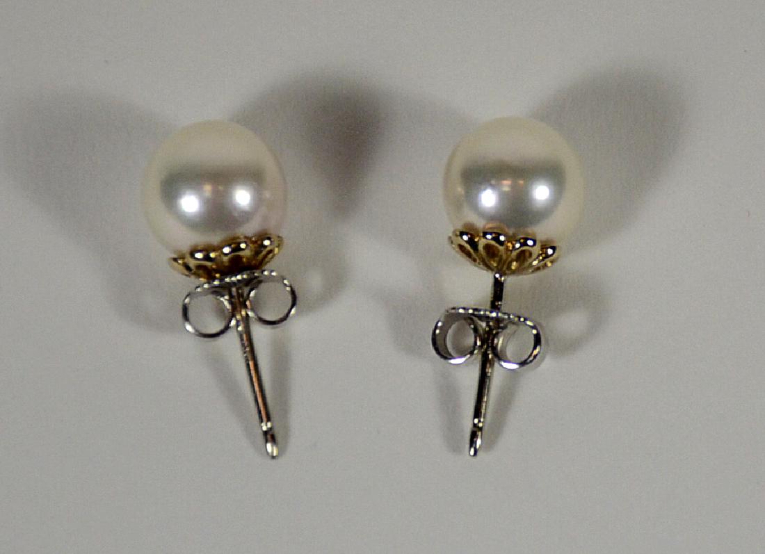 Pair Cultured Pearl Stud Earrings: 8.5-9MM, 18K white gold posts and backings. Each approx. 1/4"d. From Claus Vollrath Inc., Mt. Kisco, New York.