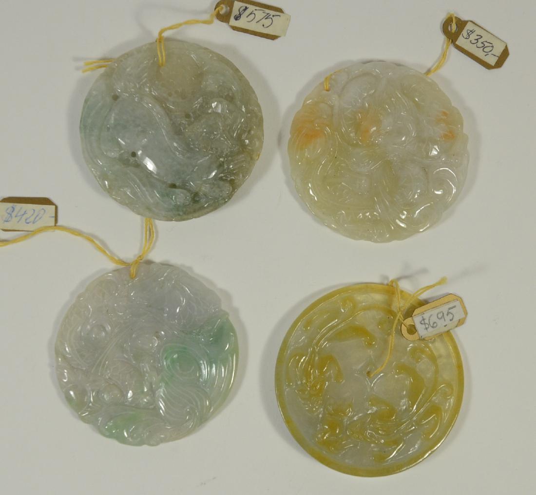Four Circular Pieces of Carved & Polished: Jade, tones of white and green. All approx. 1-7/8"d - 2"d. From Claus Collrath Inc., Mt. Kisco, New York.