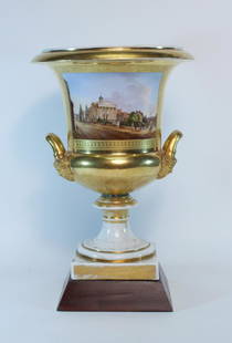 Parcel-Gilt Paris Porcelain Double-Handled Urn: French, 19th C. Depicting views of Philadelphia. Provenance: Property from the Westervelt Company, Tuscaloosa, Alabama. Hirschl and Adler Galleries, New York City.