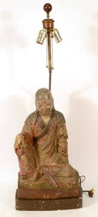 Carved Wood Polychrome Seated Figure of a Man: 20thC, Southeast Asian.Electrified and fitted as a table lamp. 35 1/2"h