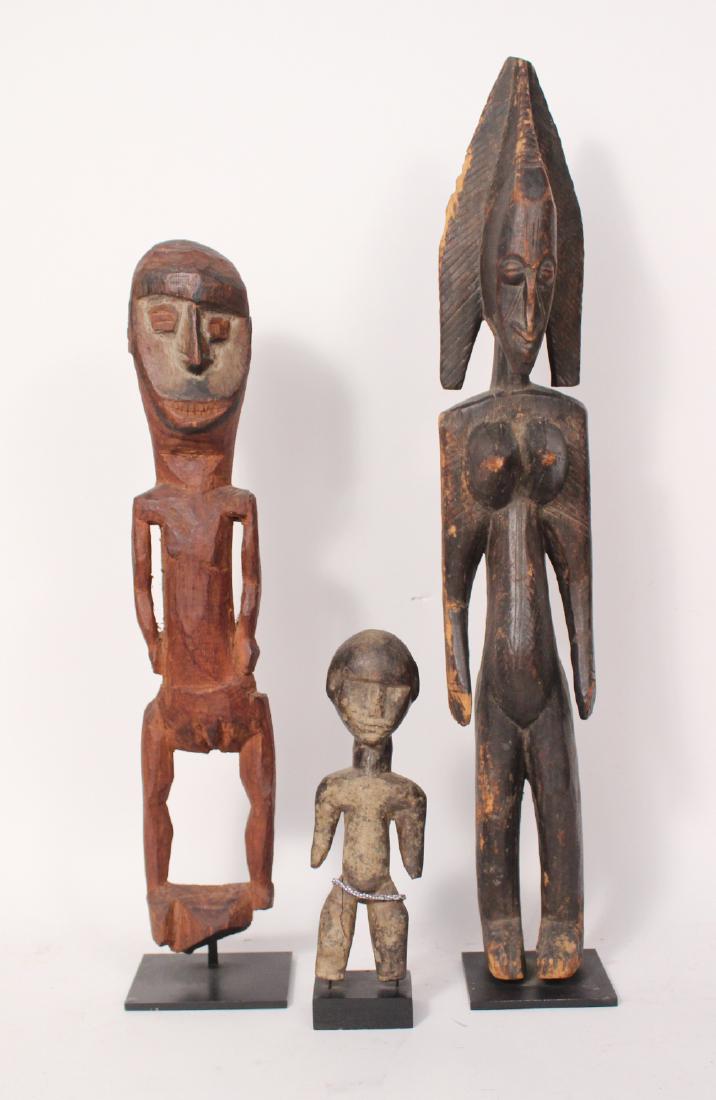 Three African Carved Wooden Figures (1 of 7)