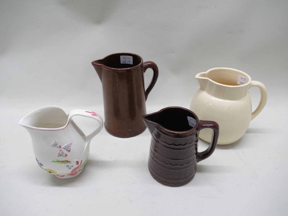 THREE CERAMIC PITCHERS (1 of 8)