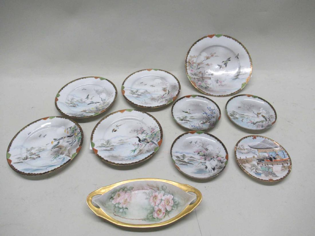 FOUR JAPANESE PLATES AND FOUR SAUCERS (1 of 6)