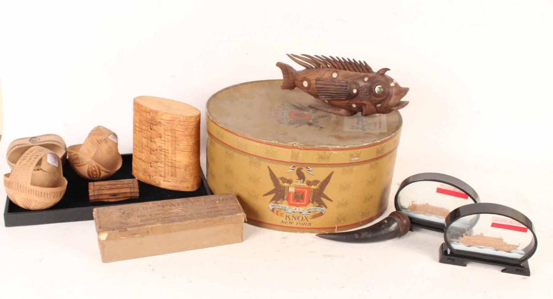 Miscellaneous Group of Table Top Articles: 19th and 20th C. Including two Chinese carved cork ship models, three carved coconut baskets, a burlwood snuff box a New York hat box, a birch bark band box, a box of "Fairy Candles," a carved hardwoo