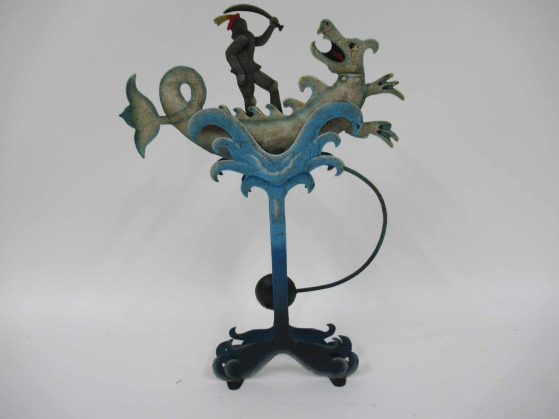 INDONESIAN KINETIC ART: Depicting warrior slaying dragon. 19 1/2" tall x 15" wide