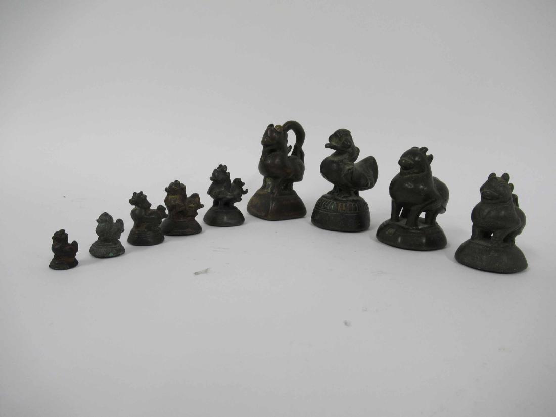 Nine ASSORTED BRONZE OPIUM WEIGHTS (1 of 4)