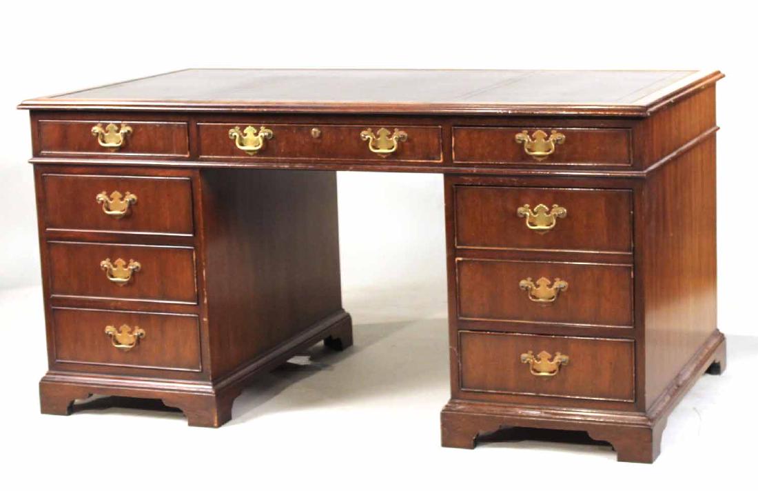 George III Style Leather-Inset Mahogany Desk: 20th C. made by Kittinger. 30-1/2"h x 5'w x 32"d