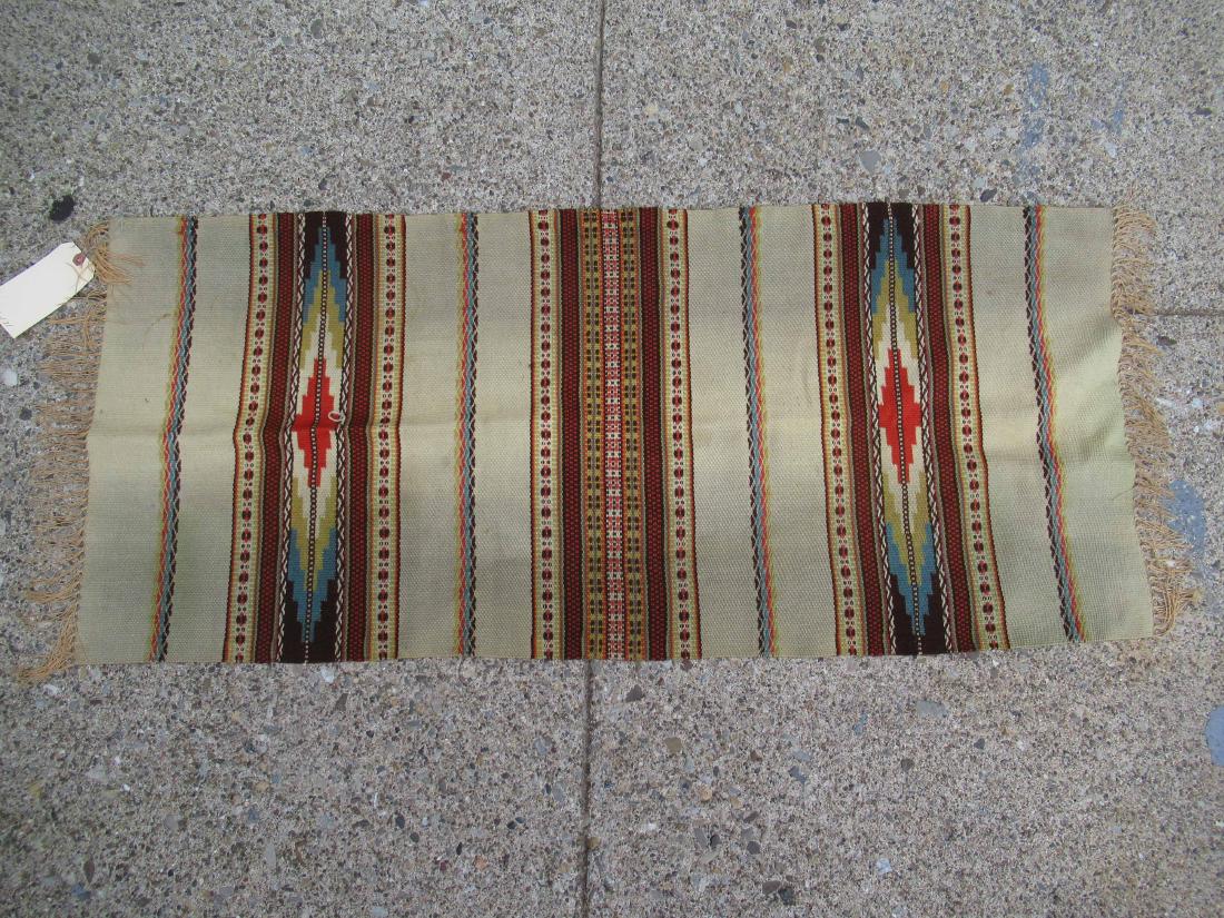 Hand made Native American blanket: Wool blanket with multi colored, striped and geometric design. 46"x20"