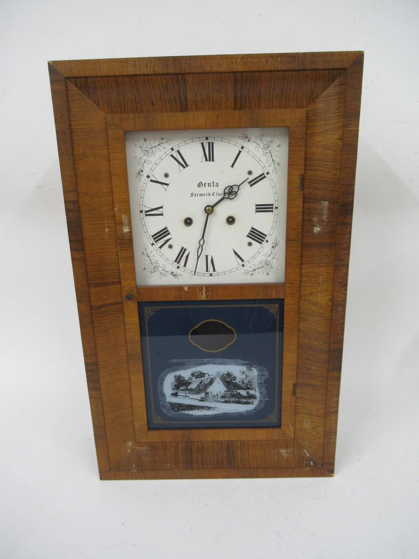 Genfa farmers clock: In Mahogany Ogee case with eglomise paneled door. 23" tall x 14" wide x 4 3/4" deep