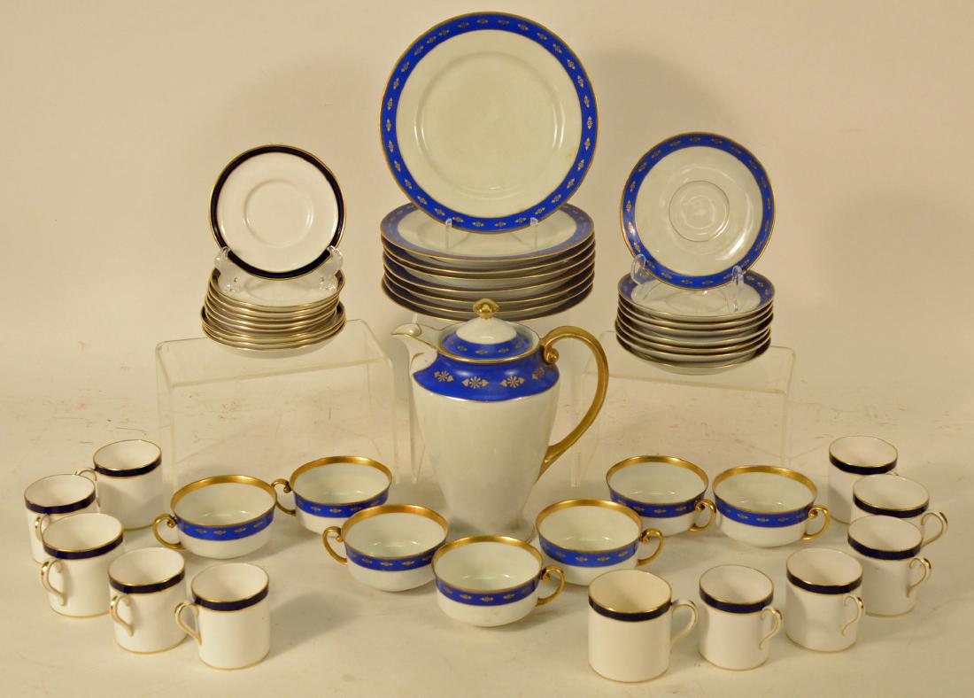 Spode Cobalt & Gilt Bone China Cups & Saucers: Comprising eleven demi-tasse cups and saucers and three tea cup saucers. Together with a Bavarian porcelain dessert set comprising a coffee pot, eight plates, eight tea cups and seven saucers. Coffee 