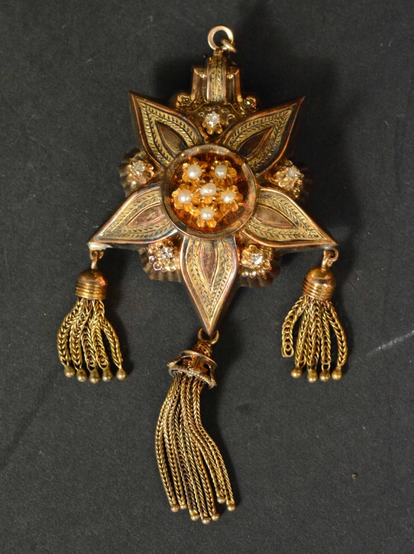 Victorian Unmarked Yellow Gold Mourning: Brooch/pendant, set with pearls and colorless stones, star form with hanging tassels, weighing 15.00dwts. 3-1/2"l including tassle.