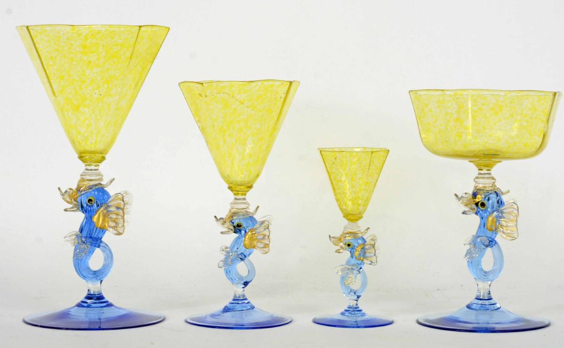 Venetian Murano Fish Stem Glass Stemware: Comprising 17 champagne/sherbet glasses, 19 water goblets, 17 wine glasses, 10 cordial glasses. Champagne, 6-1/4"h, water, 8"h, wine glass, 6-1/4"h, cordial, 4-1/2"h. From The Estate of George M. Scho