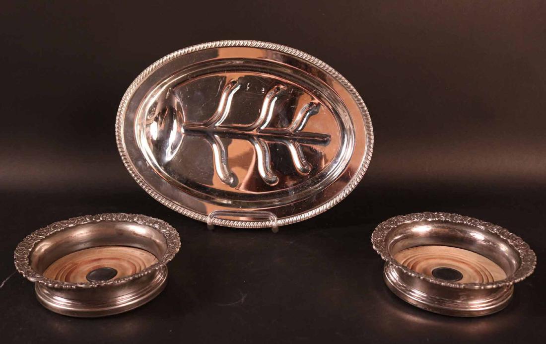 Two Silver Plated Wine Bottle Coasters: Together with a small silver plated well and tree meat platter. 10"h