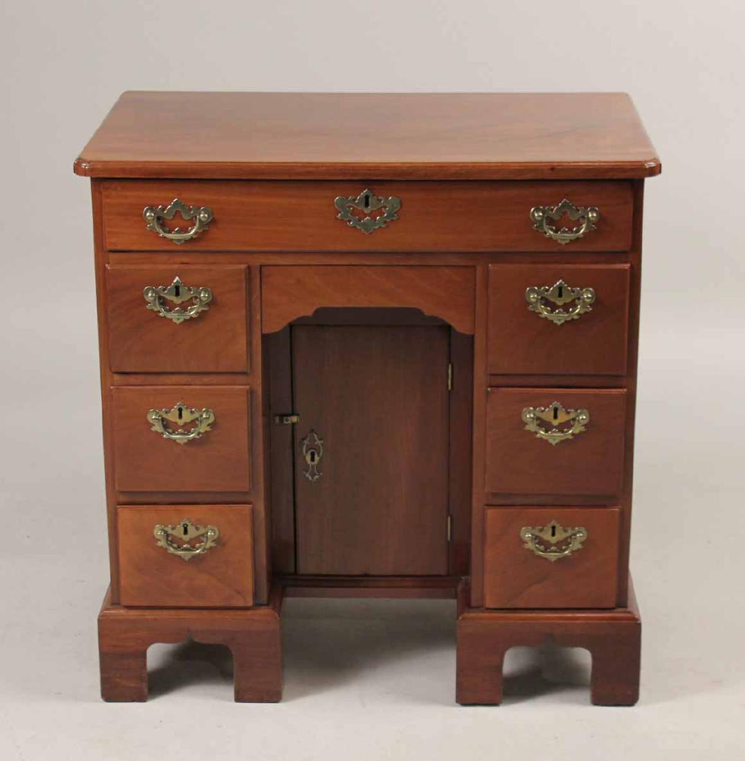George III Mahogany Kneehole Desk: English, mid-18th C. 30-1/2"h x 30"w x 19"d Provenance: Property from the Collection of Dr. Andrew and Ziva Dahl. Sothebys NY, 11/30/1984 lot 243 AND sale 6034/lot 42, 6/9/1990