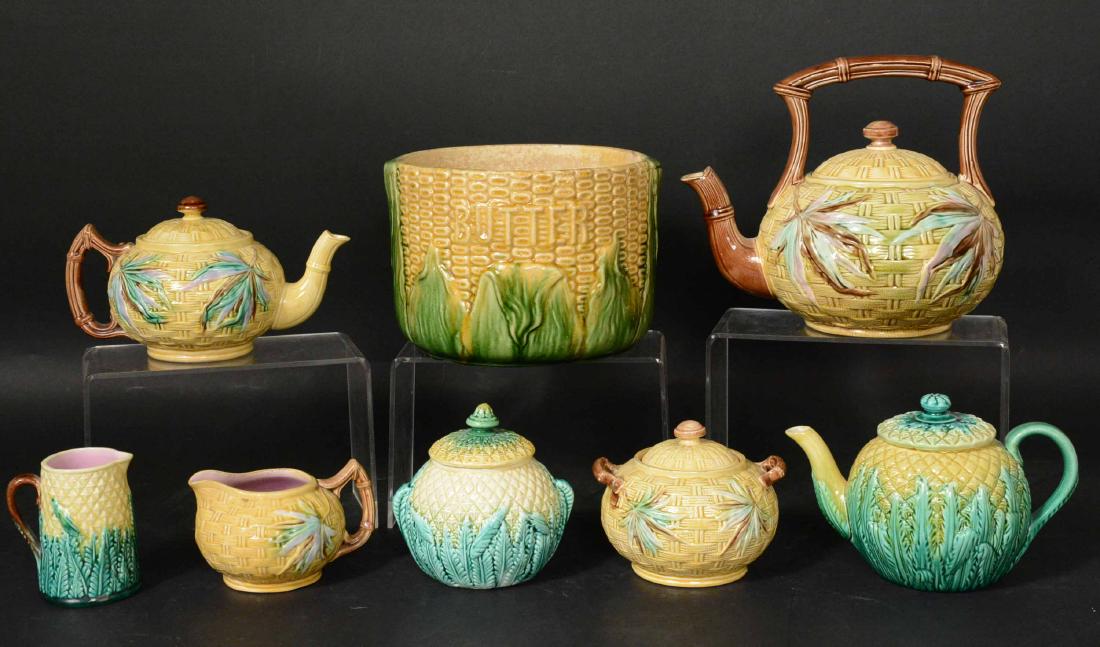 Majolica Pineapple Three Piece Tea Set: English, 19th Century. Together with a Majolica Banks & Thorley Bamboo four piece tea set and a Majolica corn and leaf cache pot. Cache pot 6"h x 7 1/2"d Provenance: Property from the Collection of Dr