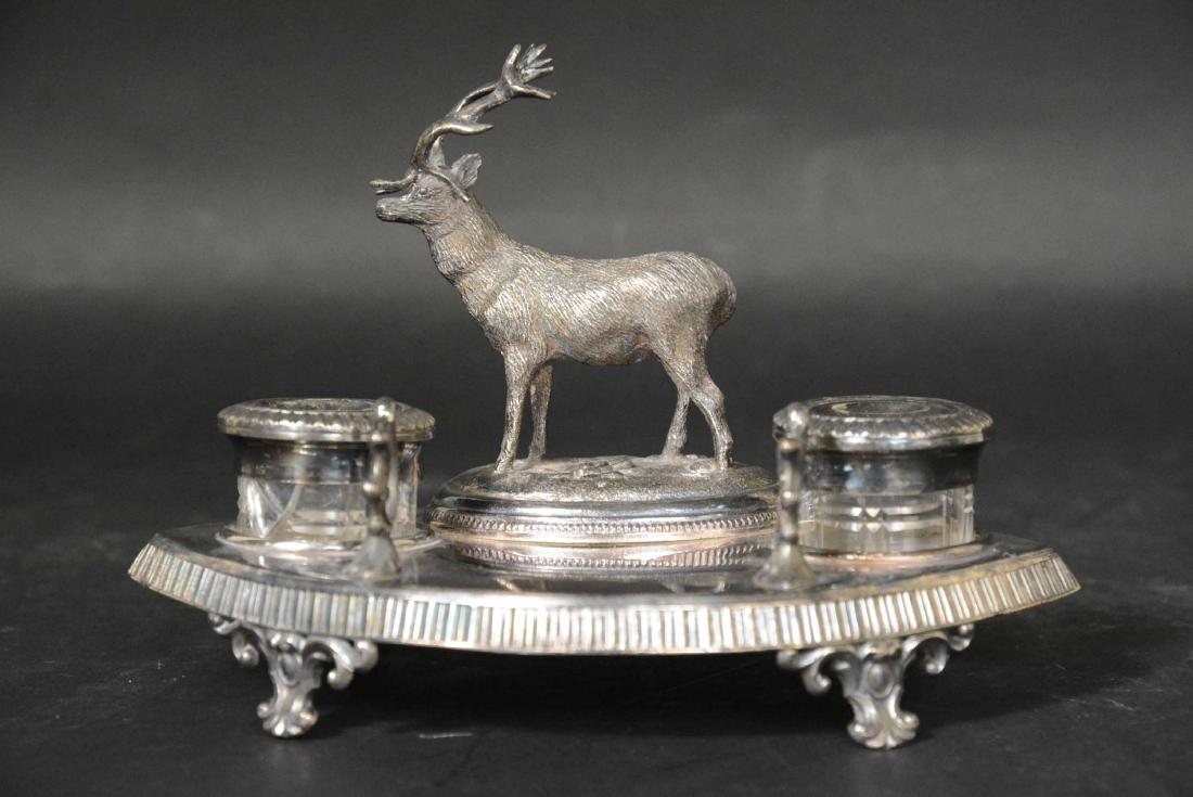 Deakin & Son Sheffield Plate Stag Motif: oval footed ink stand with two silver plated mounted glass ink pots, English, George I, 18th century, applied stag on rock work base, pen rack. 5-1/2"h to top of antlers x 8"l. Provenance: Property fr