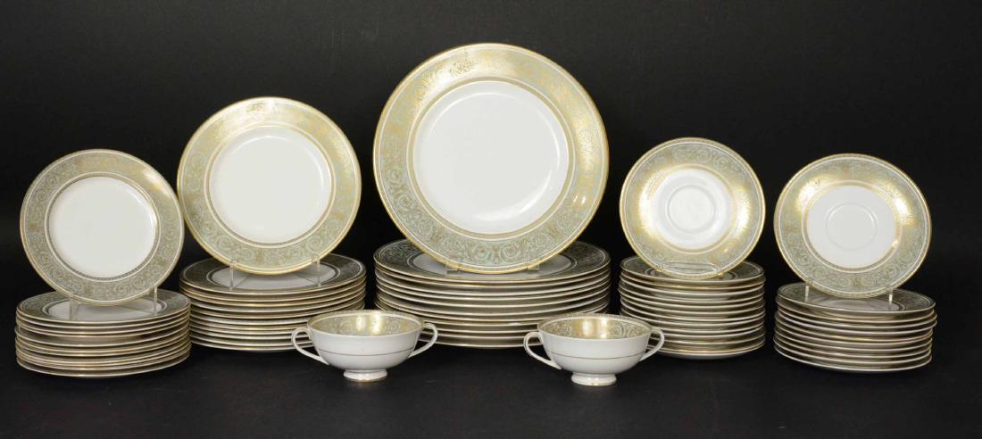 Partial Royal Doulton "English Renaissance" Patt: Comprising twelve each dinner plates, luncheon plates and bread and butter plates, fourteen saucers and two bouillon cups. 63 pieces. Various Provenance: Property from the Collection of Dr. Andrew and