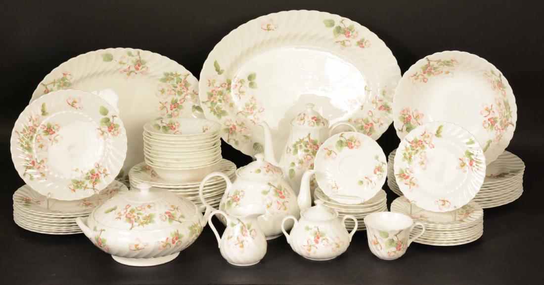 Wedgwood "Apple Blossom" Dinner Service: Comprising ten each dinner plates, cereal bowls, rim soup bowls, luncheon plates, bread and butter plates and cups and saucers, coffee pot, tea pot, covered vegetable dish, open vegetable bowl, creame