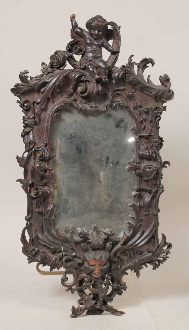 Victorian Carved Wood Mirror: Dated 1903, mounted with easel stand. 30-1/2"h x 17"w