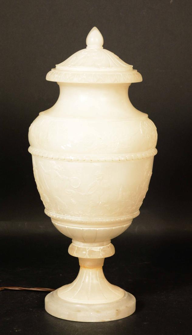 Carved Alabaster Covered Urn: Electrified as a lamp, acanthus decorated neoclassical scenes. 19"h.