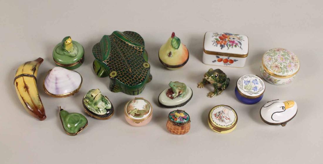 Group of Porcelain and Enamel Boxes: French & English. Comprising seven Limoges porcelain boxes, one Herend porcelain box, four English enamel boxes, one shell form box, one Pierre Deux duck box, a gilt metal frog box and paper mache fro