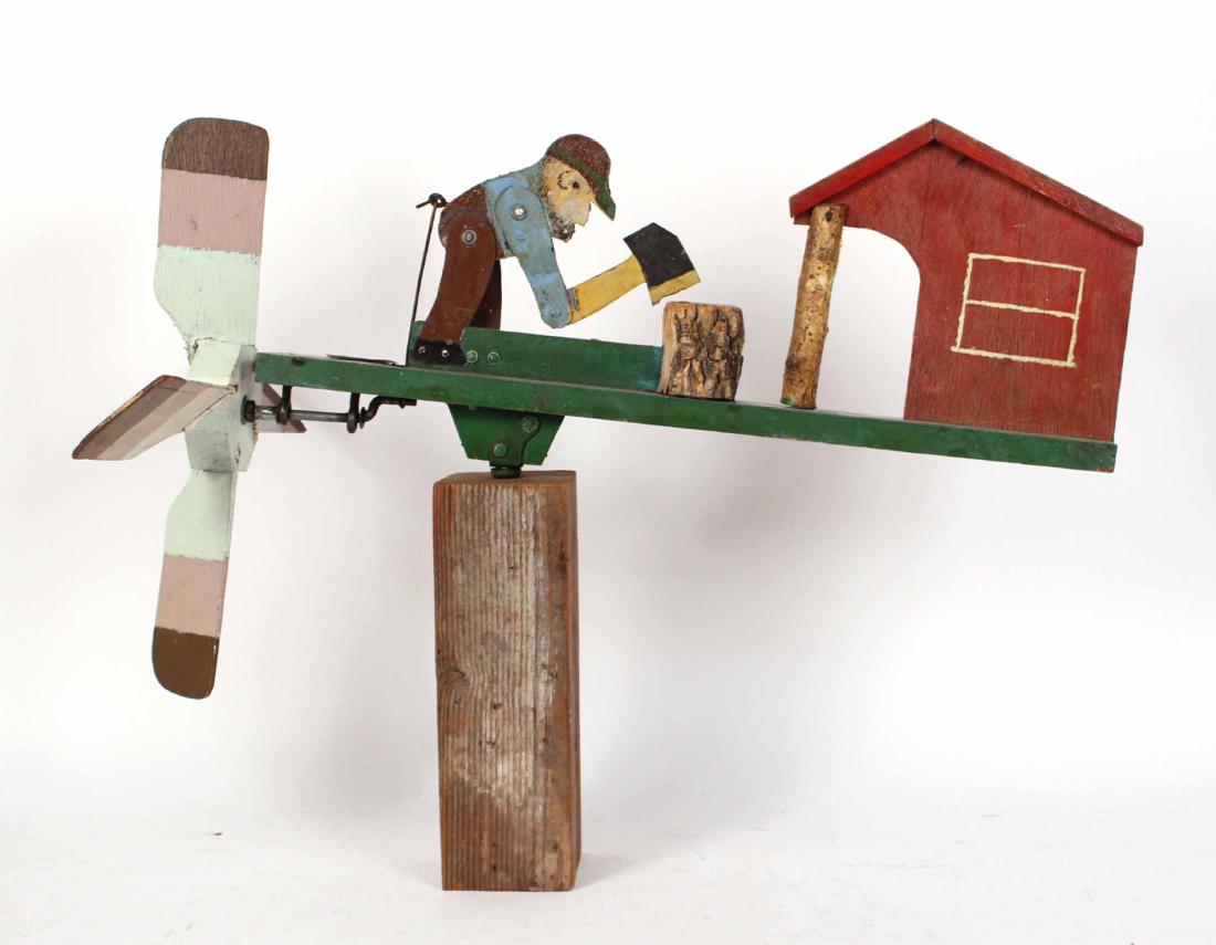 Painted Wood Figural Whirligig: Depicting a man chopping wood. 20"h x 25"w
