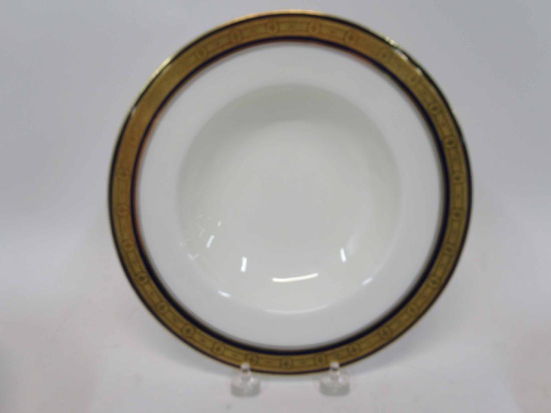 Set of Twelve Royal Worcester Bowls: Gilt and blue decorated border made for Caldwell Philadelphia #651926. 9" dia