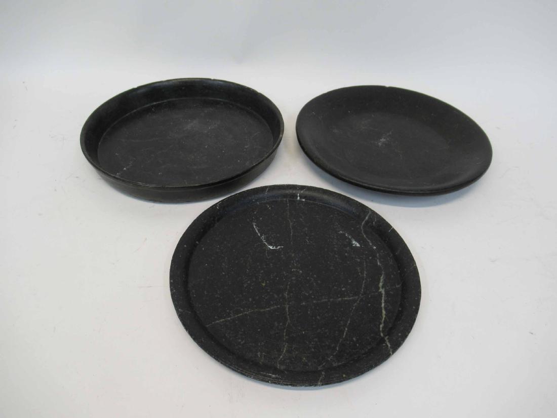 Three Soapstone Serving Dishes: One with inscribed central floral design. Largest dish 11 1/2" dia x 1 3/8" tall