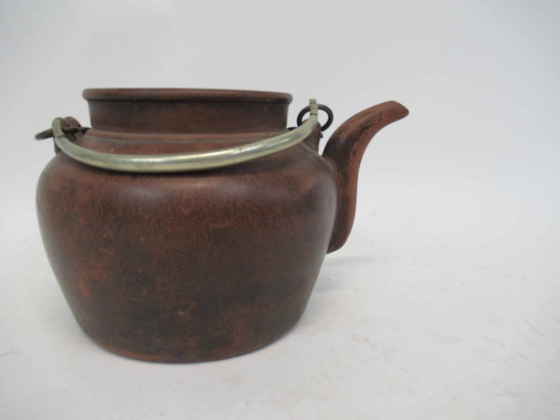 Oriental Earthenware Kettle: Having double metal handles. 9" x 7" x 5 1/2" tall