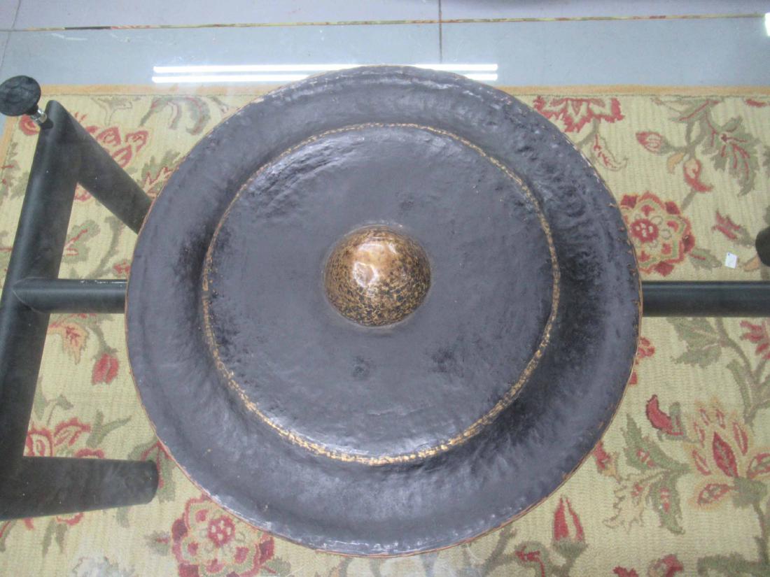 Oriental Bronze Gong: Embossed round center with black patina. 24" dia x 5" deep