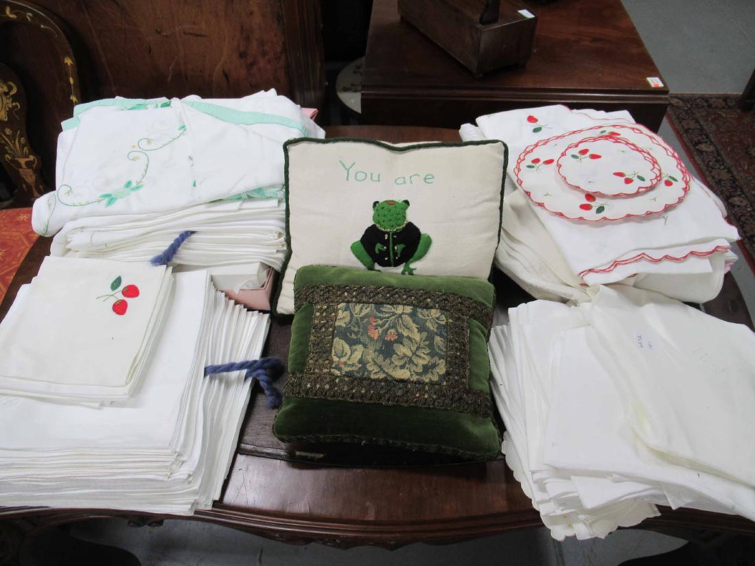 Large Group of Table Linens: Together with a pair of green velvet throw pillows and a "You are Unfrogetable" throw pillow. Various