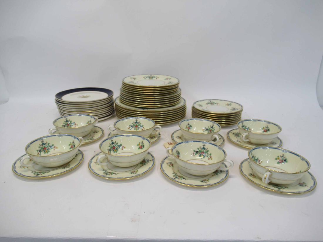 Lenox Porcelain Dinner Service "Chippendale": Comprising eight dinner plates, six luncheon plates,six salad plates, eight dessert plates, eight bouillon bowls and underplates. Together with twelve Taylor Smith & Taylor Versatile porcelain luncheo