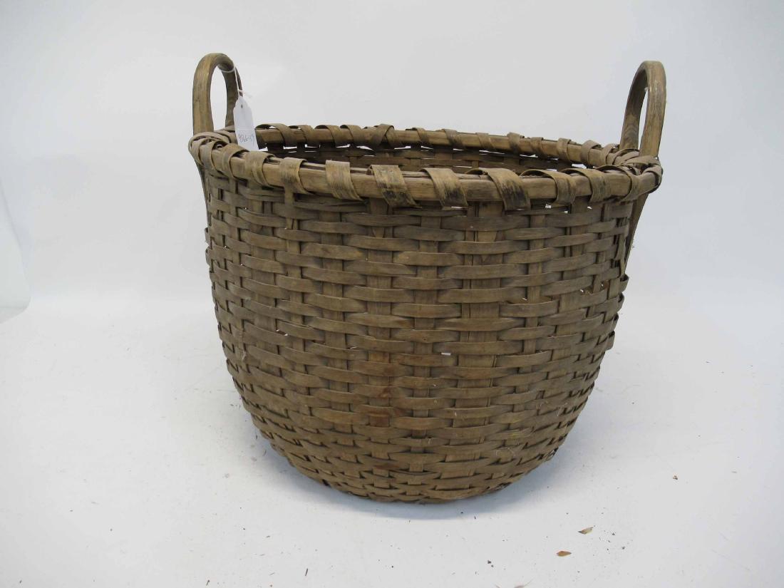 Antique Wooden Splint Basket: Double handled woven basket, possibly Northeastern Native American. 18" x 19" x 17"tall