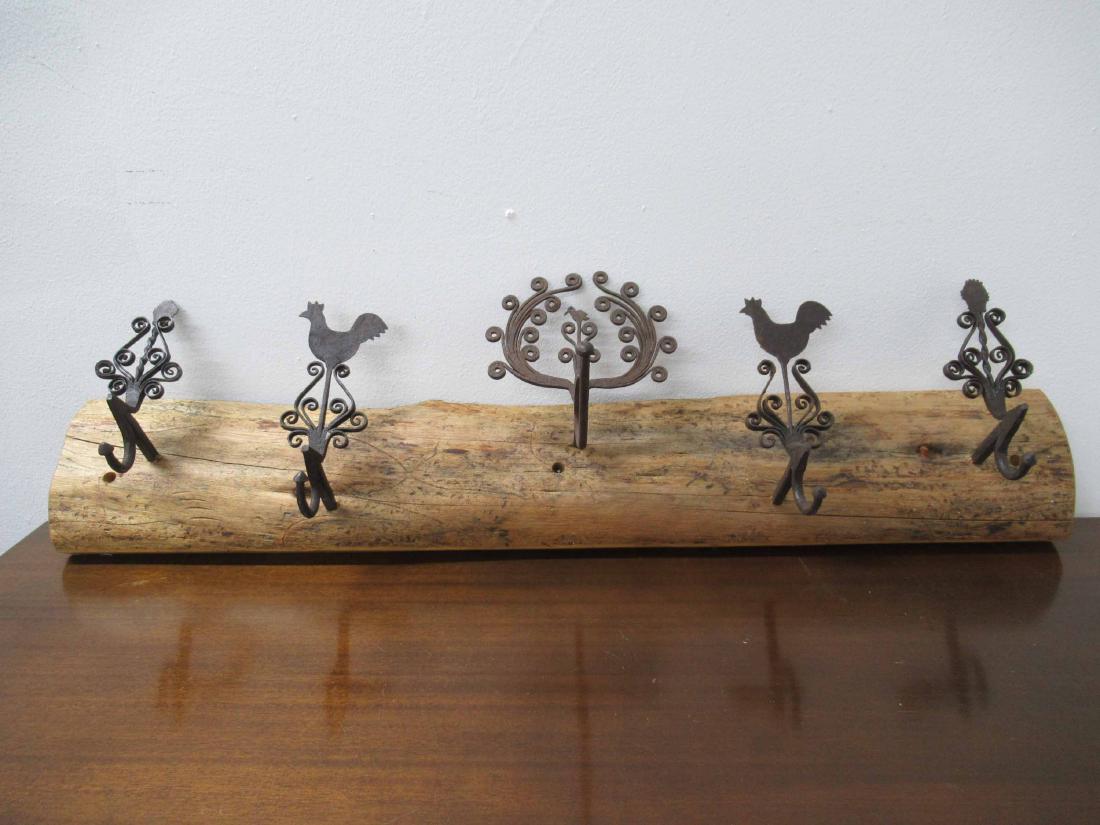 Five Hand Wrought Iron Coat Racks: Mounted on wooden plaque depicting birds, chickens and scroll work. 36" long x 8 1/4" deep x 9" tall