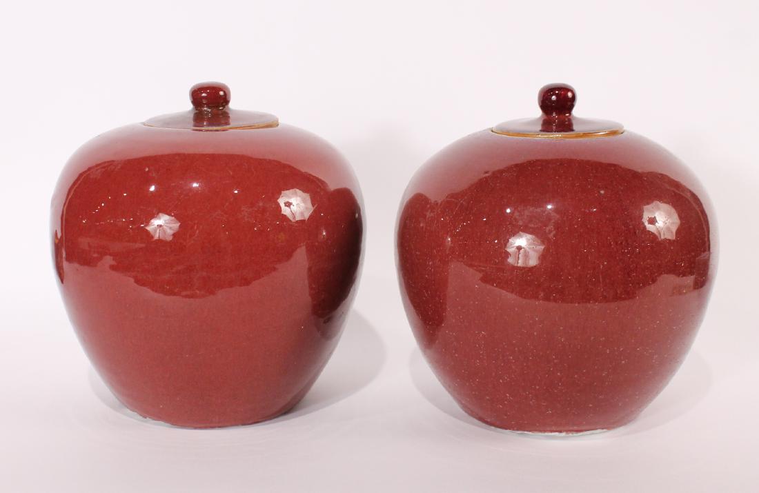 Pair of Chinese Sang de Boeuf Jars with Lids: Qing Dynasty. 9"h