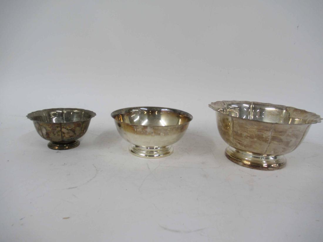 Three Silver Plated Trophy Bowls: Largest, 4-3/4"h x 9-3/4"d.