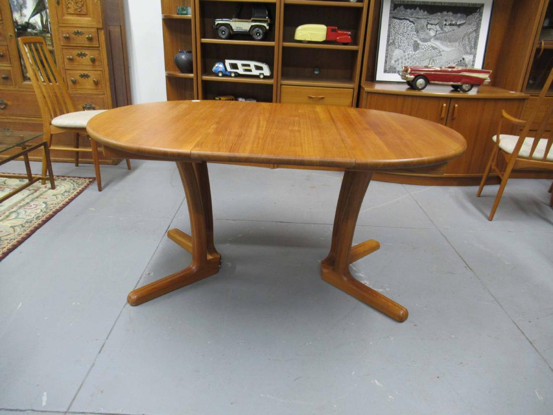 Danish Modern Dining Table: Siso Denmark Dyrlund teakwood. Together with one leaf. table closed size 39" dia