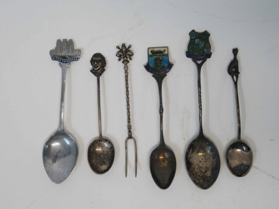 Five Sterling Souvenir Spoons: Some with enamel. Together with a 800 silver cocktail fork.