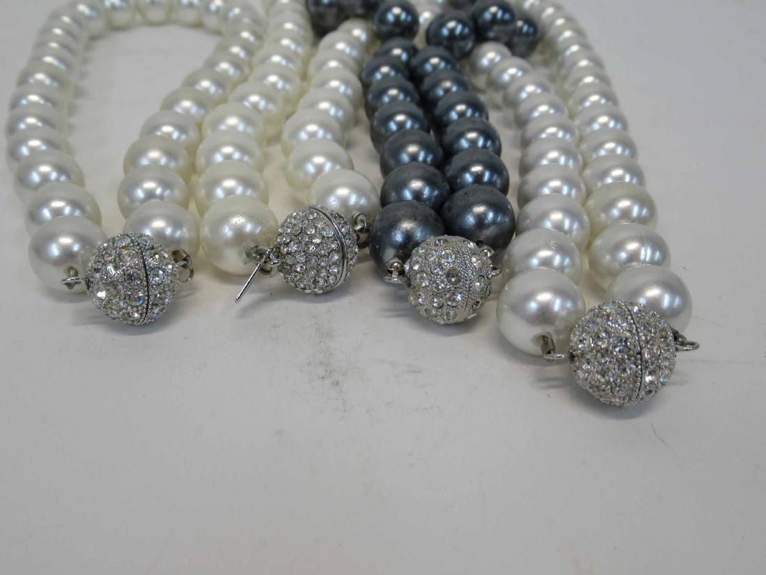 Four South Sea and Tahitian Pearl Necklaces: Each with faux diamond ball clasps. Longest 19"l.