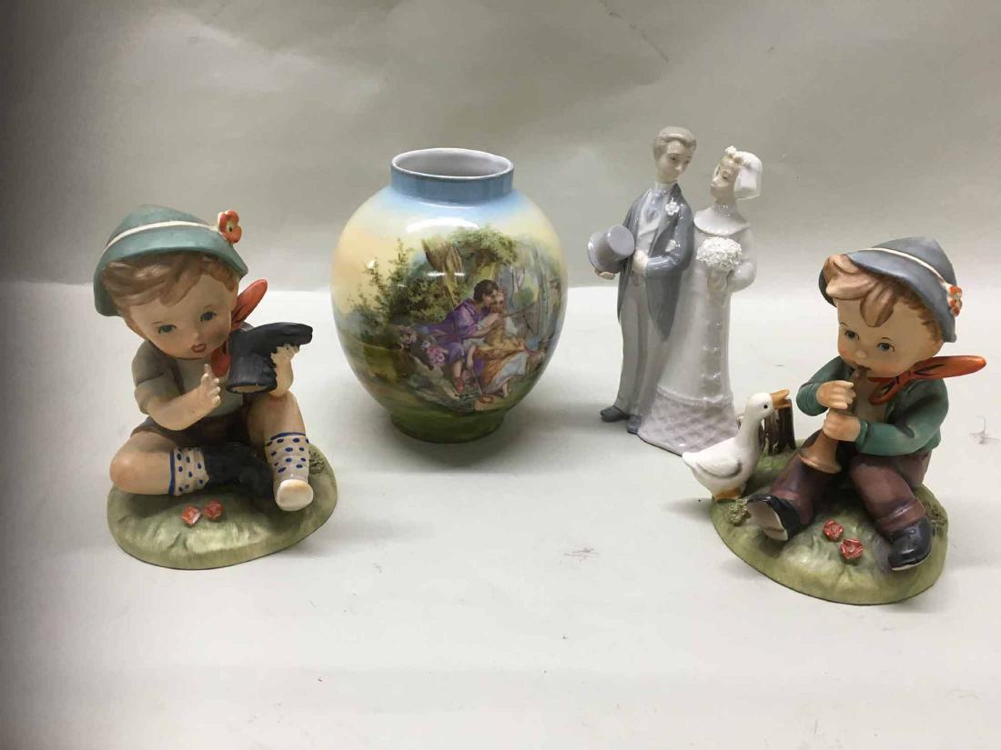 Hand Painted Vase: Depicting two young girls playing a musical instrument lakeside. Together with two Hummel style figurines and a Lladro figural. Vase 6 1/2" tall by 5 1/2" diameter