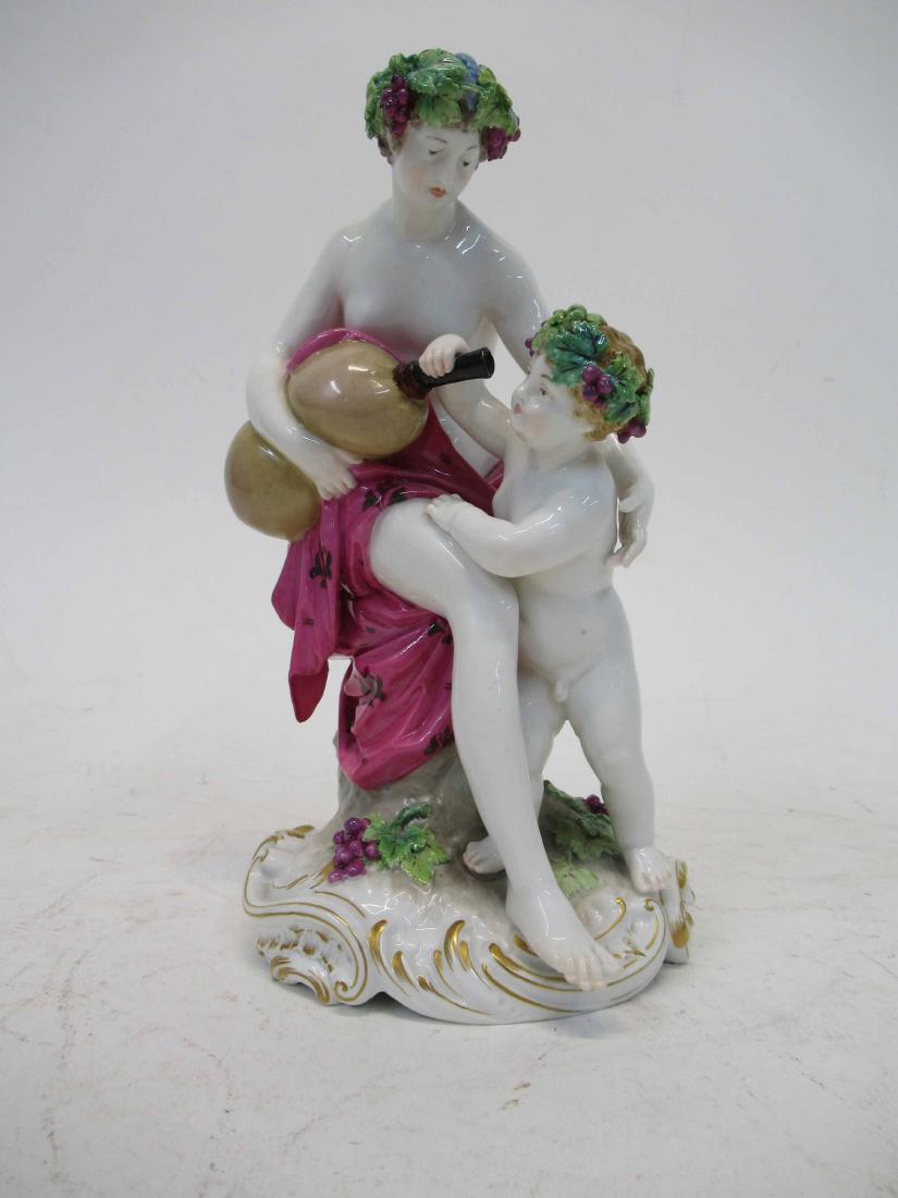 KPM Figural Group: Mother giving water young child. 7 3/4" tall x 4" dia